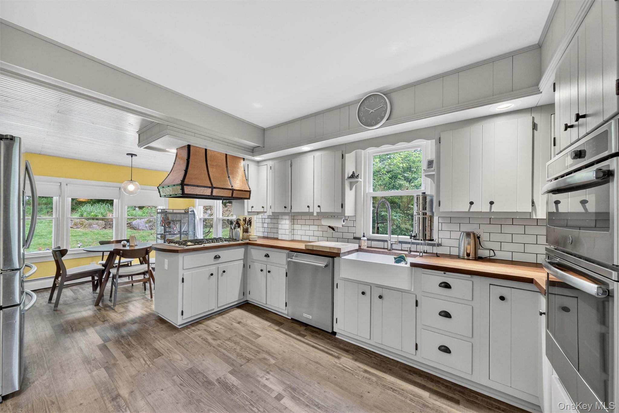 10 Edwin Road Poughkeepsie, NY 12603 - Photo 13 of 46 a kitchen with sink cabinets and wooden floor