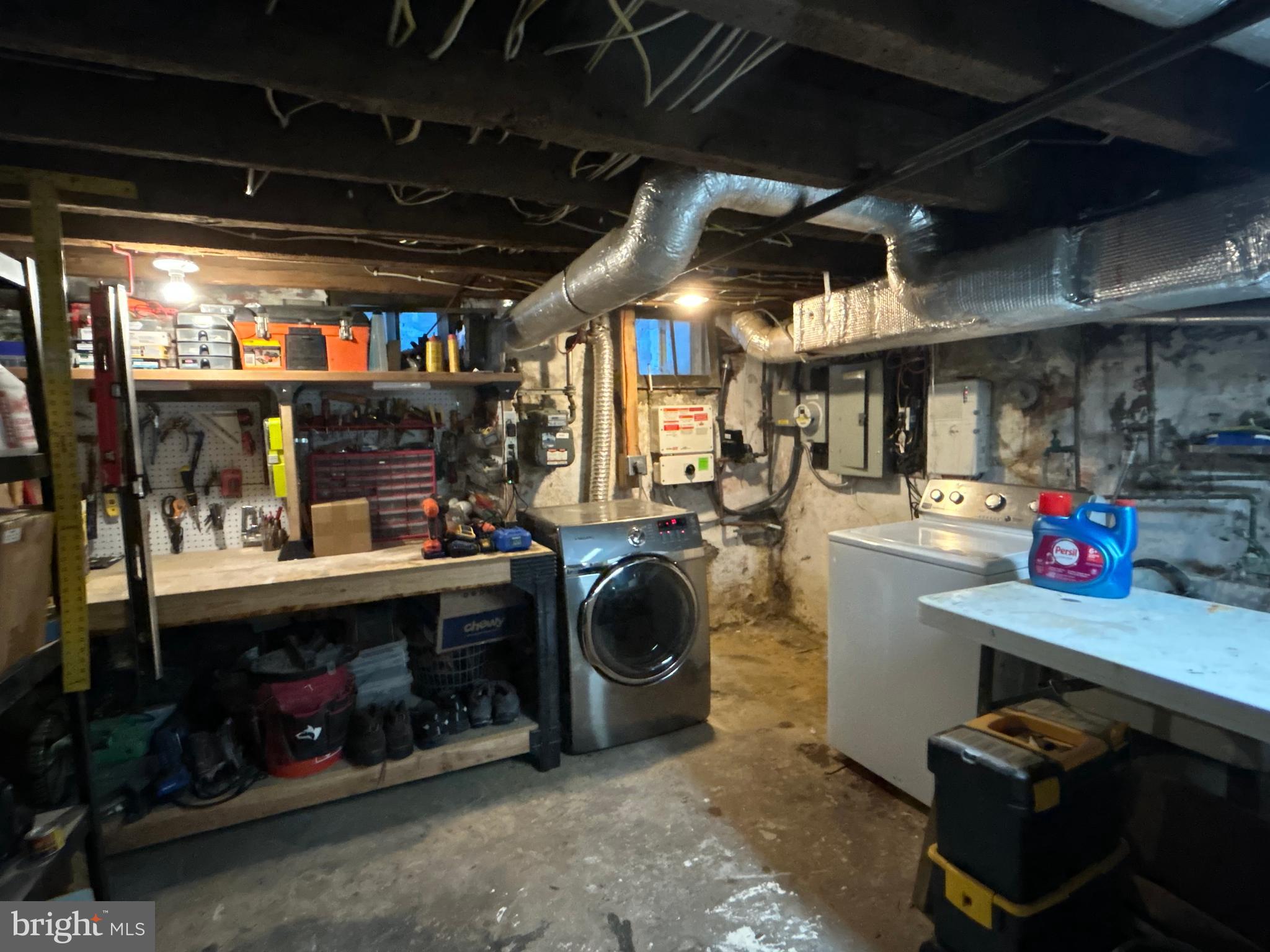 1318 South Alder Street Philadelphia, PA 19147 - Photo 39 of 39 a room with gym equipment and a table