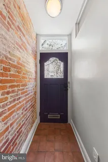 a view of entryway with a hallway