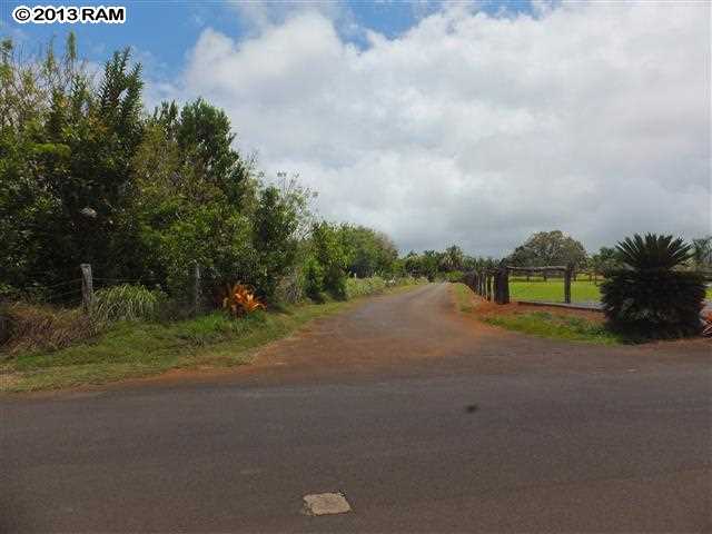 0 Hog Back Road, Unit LOT 17 Haiku, HI 96708 - Photo 9 of 11 a view of a road with a house in the background