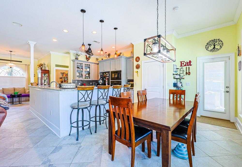 232 Waterfall Circle Little River, SC 29566 - Photo 11 of 40 Dining space featuring crown molding and recessed lighting