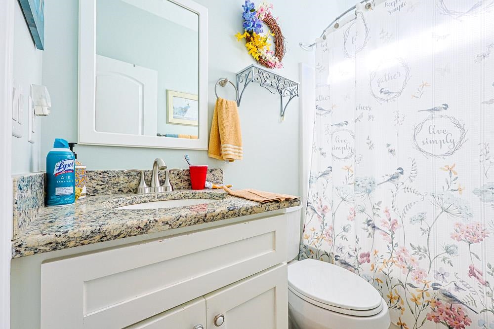 232 Waterfall Circle Little River, SC 29566 - Photo 24 of 40 Bathroom with vanity and curtained shower
