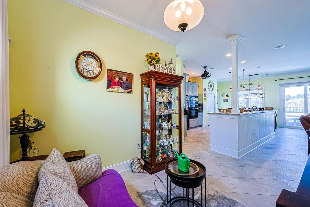 232 Waterfall Circle Little River, SC 29566 - Photo 29 of 40 Living area with ornamental molding, light tile patterned floors, and recessed lighting