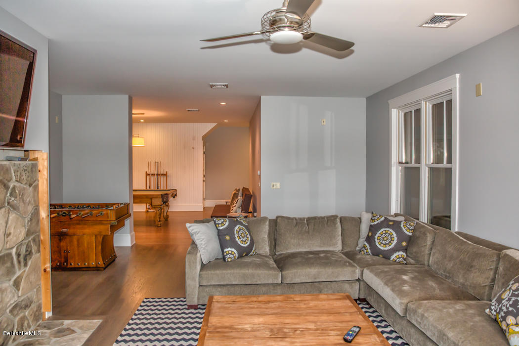 66 Mallard Road Otis, MA 01029 - Photo 23 of 26 a living room with furniture and wooden floor