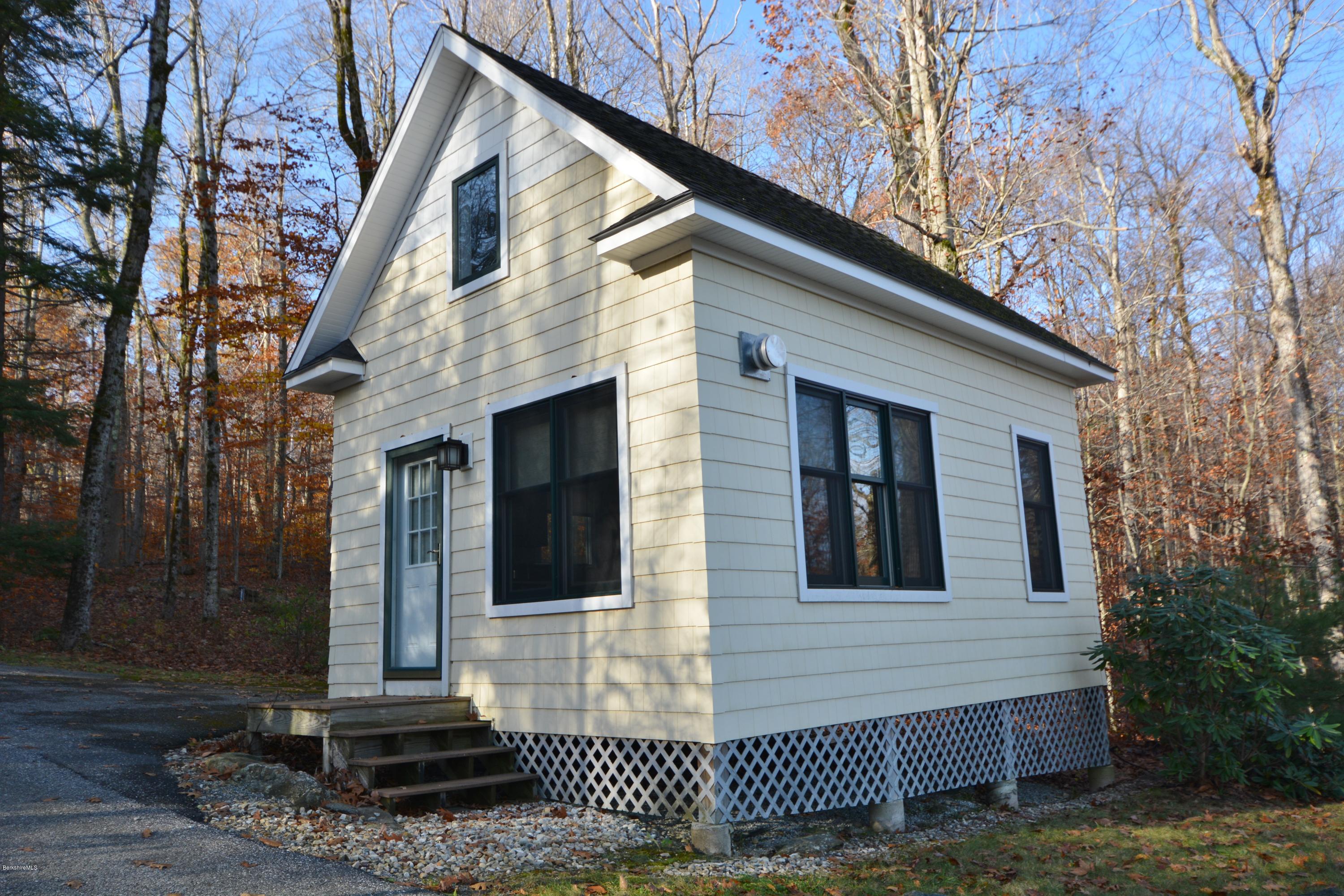 66 Mallard Road Otis, MA 01029 - Photo 26 of 26 a view of a house with a yard