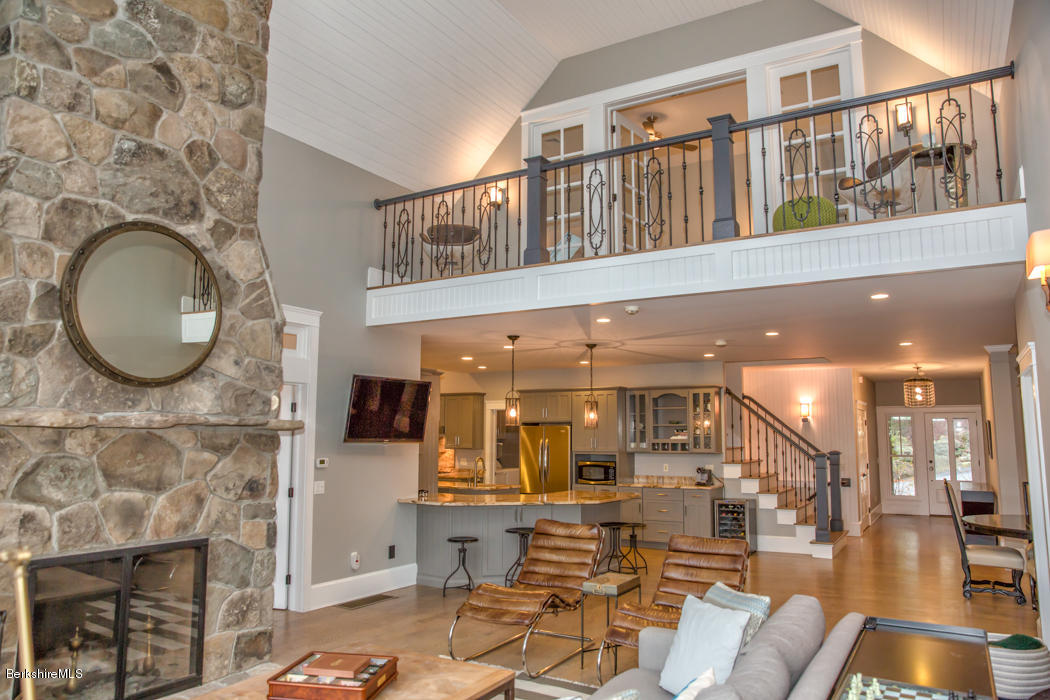 66 Mallard Road Otis, MA 01029 - Photo 8 of 26 a living room with fireplace furniture and a fireplace