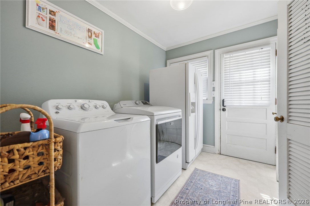 1322 Carolina Drive Rockingham, NC 28379 - Photo 9 of 28 a utility room with dryer and washer