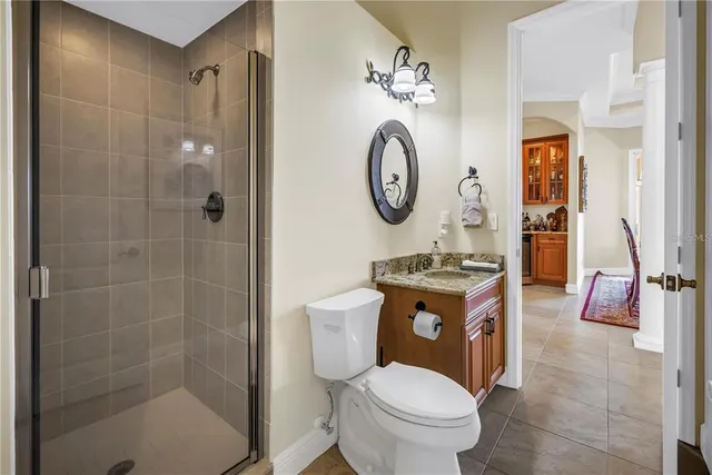 a kitchen with stainless steel appliances granite countertop a stove and a refrigerator