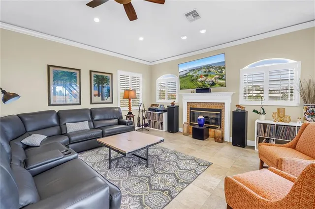 a kitchen with a stove and a wooden floor
