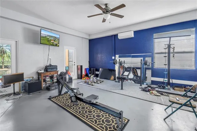 a view of a swimming pool with sitting area