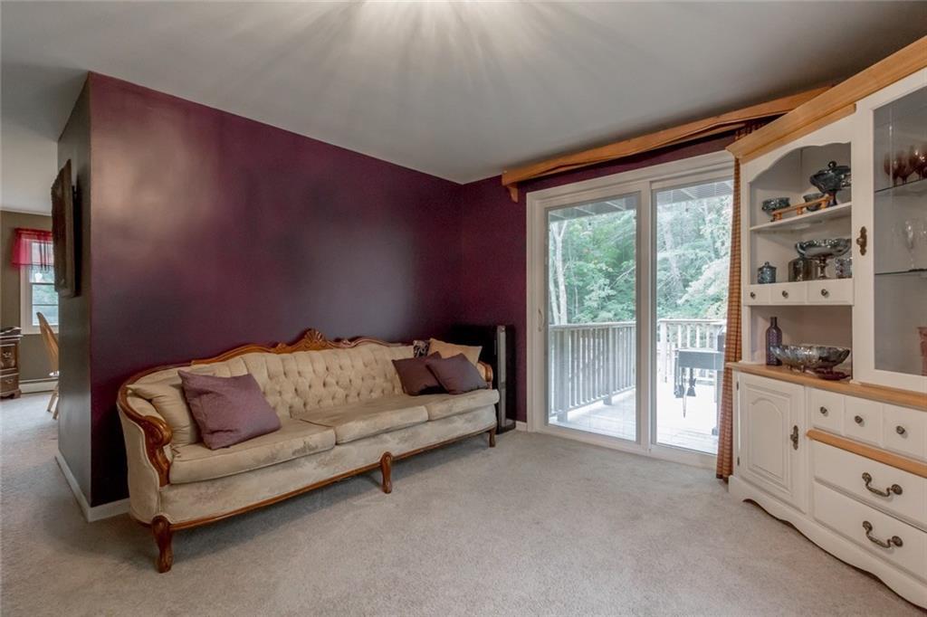 468 Bridgton Road Westbrook, ME 04092 - Photo 13 of 33 A formal living room has new slider...