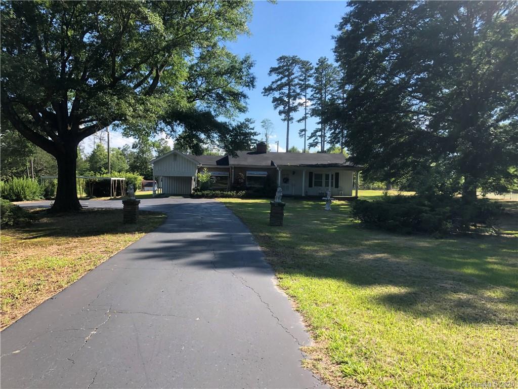 6234 Cress Road Concord, NC 28025 - Photo 1 of 24 a view of a house with swimming pool