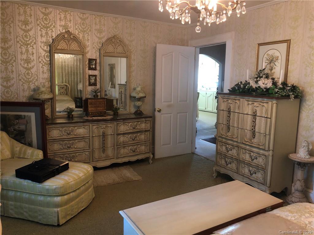 6234 Cress Road Concord, NC 28025 - Photo 20 of 24 a living room with furniture and a wooden floor