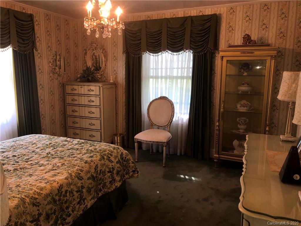 6234 Cress Road Concord, NC 28025 - Photo 21 of 24 a bedroom with a bed and furniture