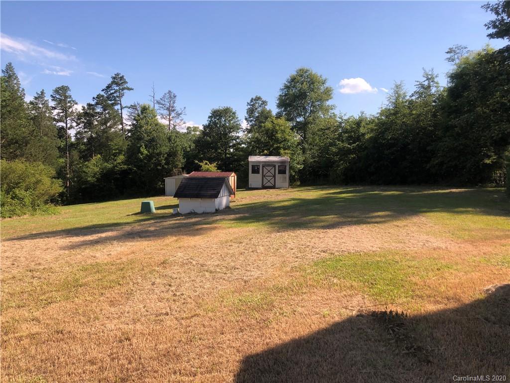 6234 Cress Road Concord, NC 28025 - Photo 8 of 24 a view of a swimming pool with an ocean view