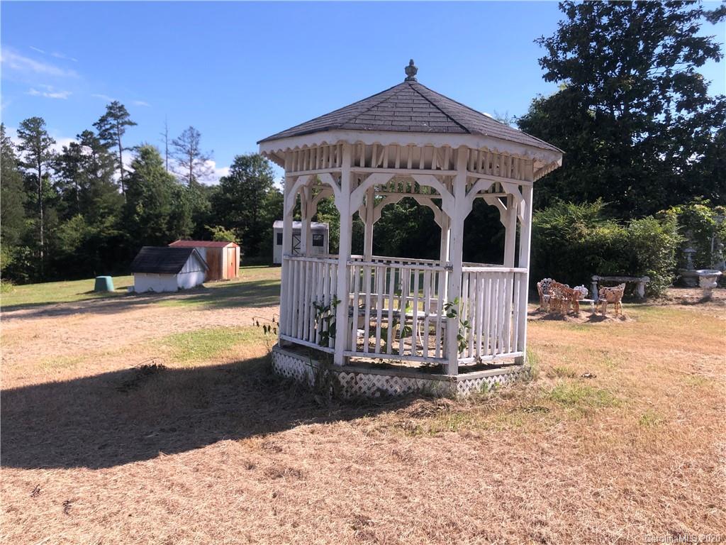 6234 Cress Road Concord, NC 28025 - Photo 10 of 24 a view of swimming pool with an outdoor seating