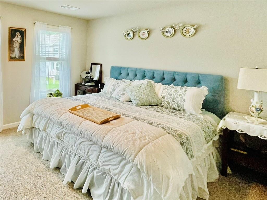 3015 Winding Ridge Waleska, GA 30183 - Photo 28 of 40 a bedroom with a bed and wooden floor