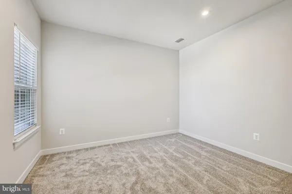 a bathroom with a shower and a toilet