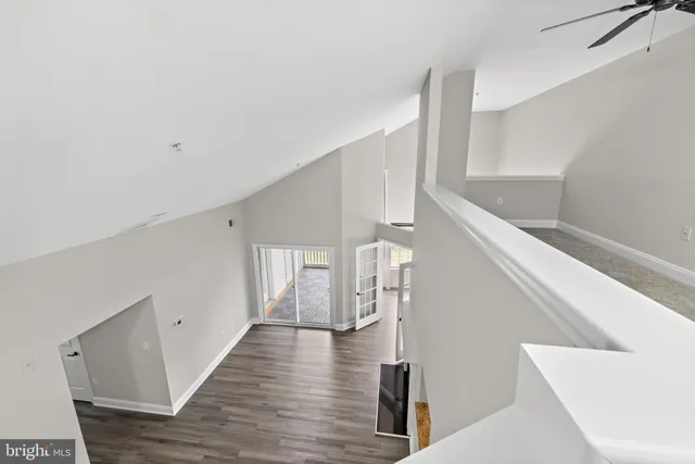 a view of a room with a large window