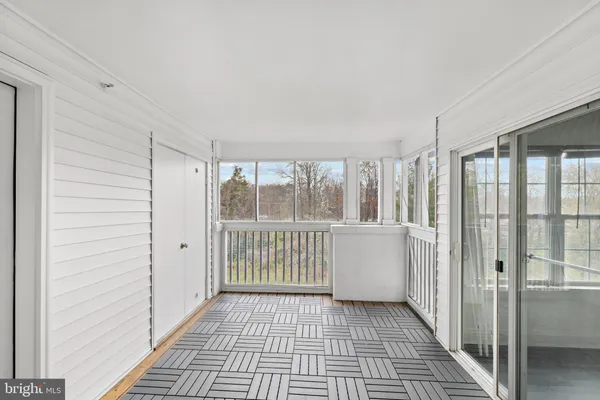 a picture of a room with wooden floor
