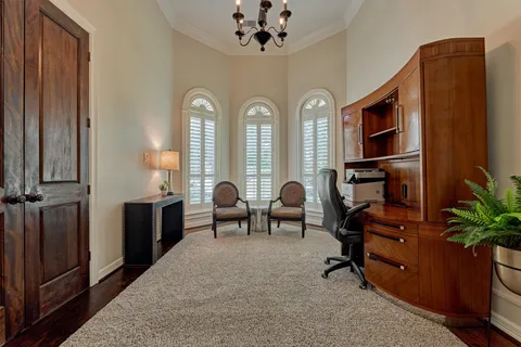 a view of a livingroom with furniture and window