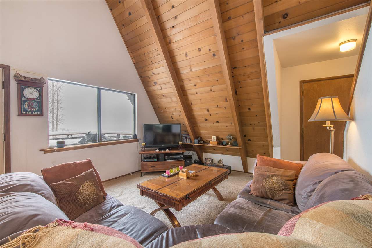 14060 Donner Pass Road Truckee, CA 96161 - Photo 4 of 14 a living room with furniture and a large window