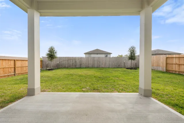 a view of an outdoor space and a yard