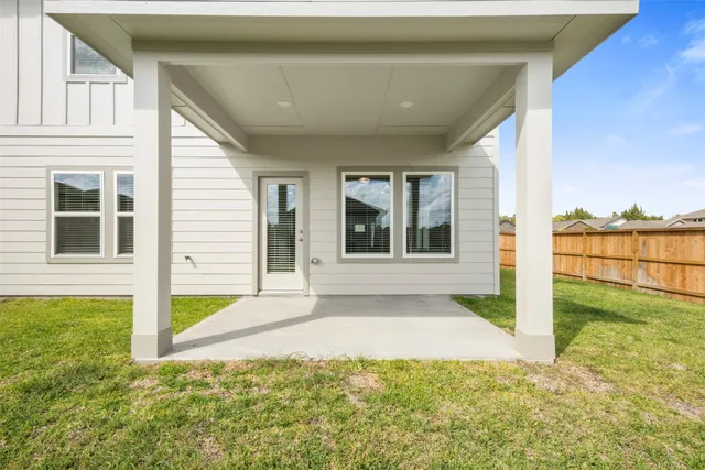 a house with trees in the background
