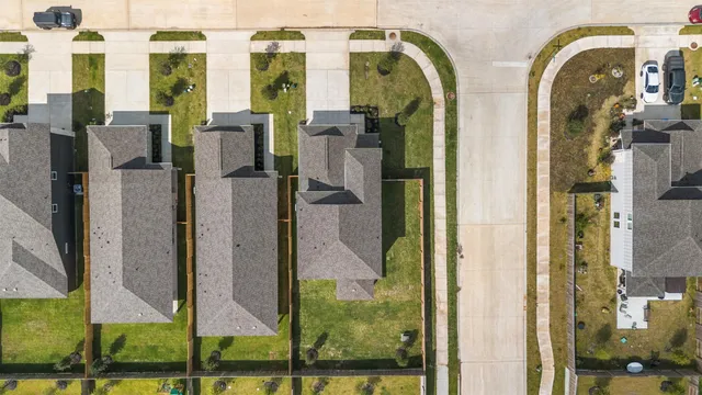 a picture of a bathroom with floor to ceiling windows