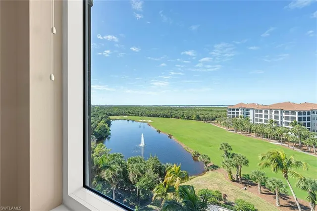 a bedroom with a bed and a view of bathroom