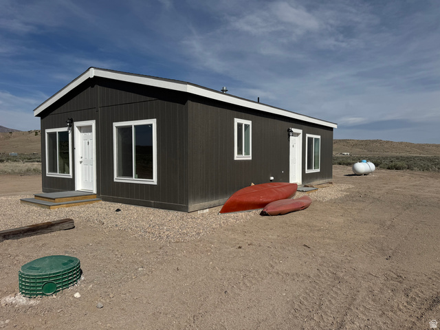 Front and side of home. Canoe and paddle board included.