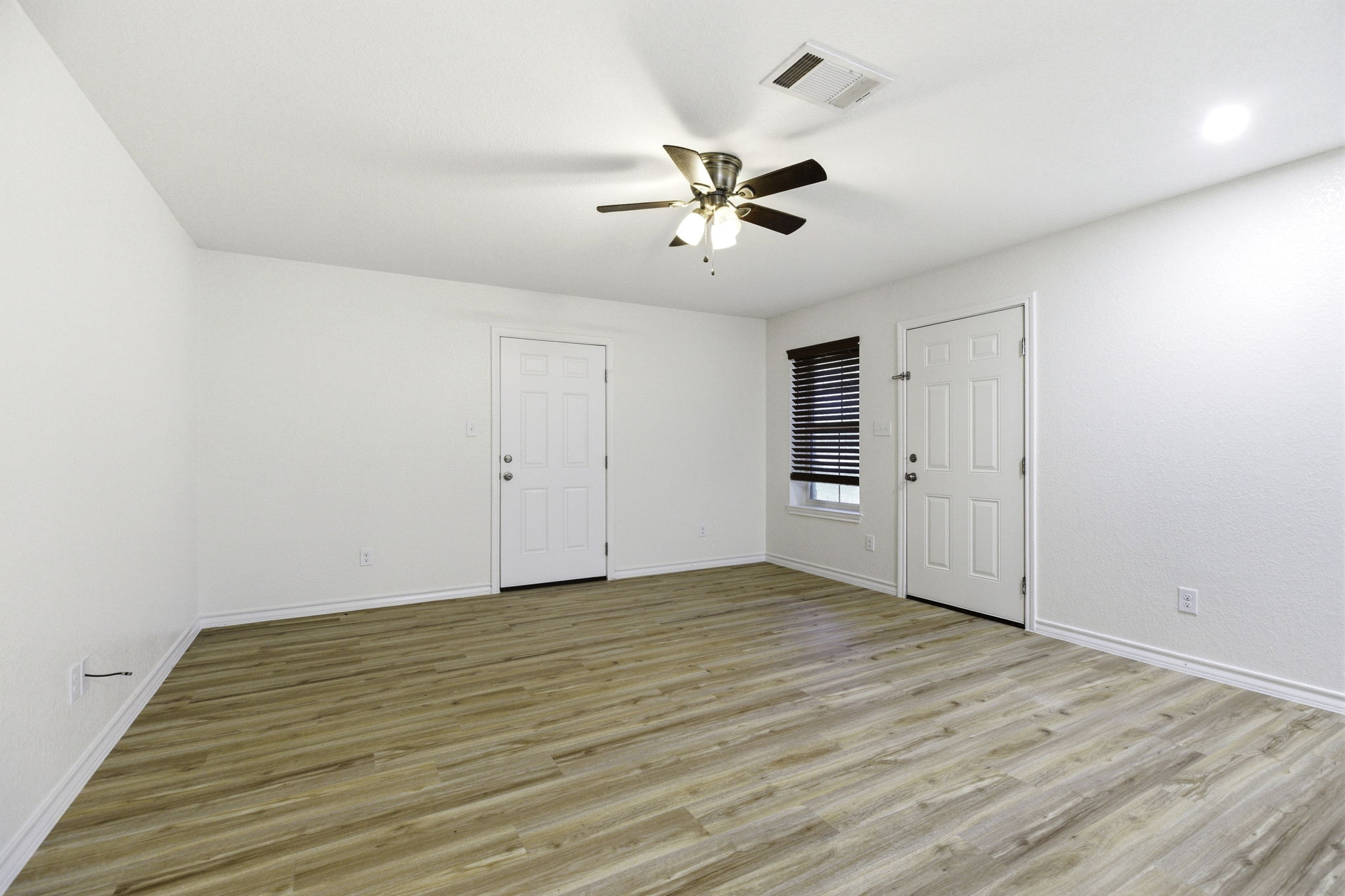 823 North Commerce Street, Unit A Lockhart, TX 78644 - Photo 15 of 28 a view of an empty room