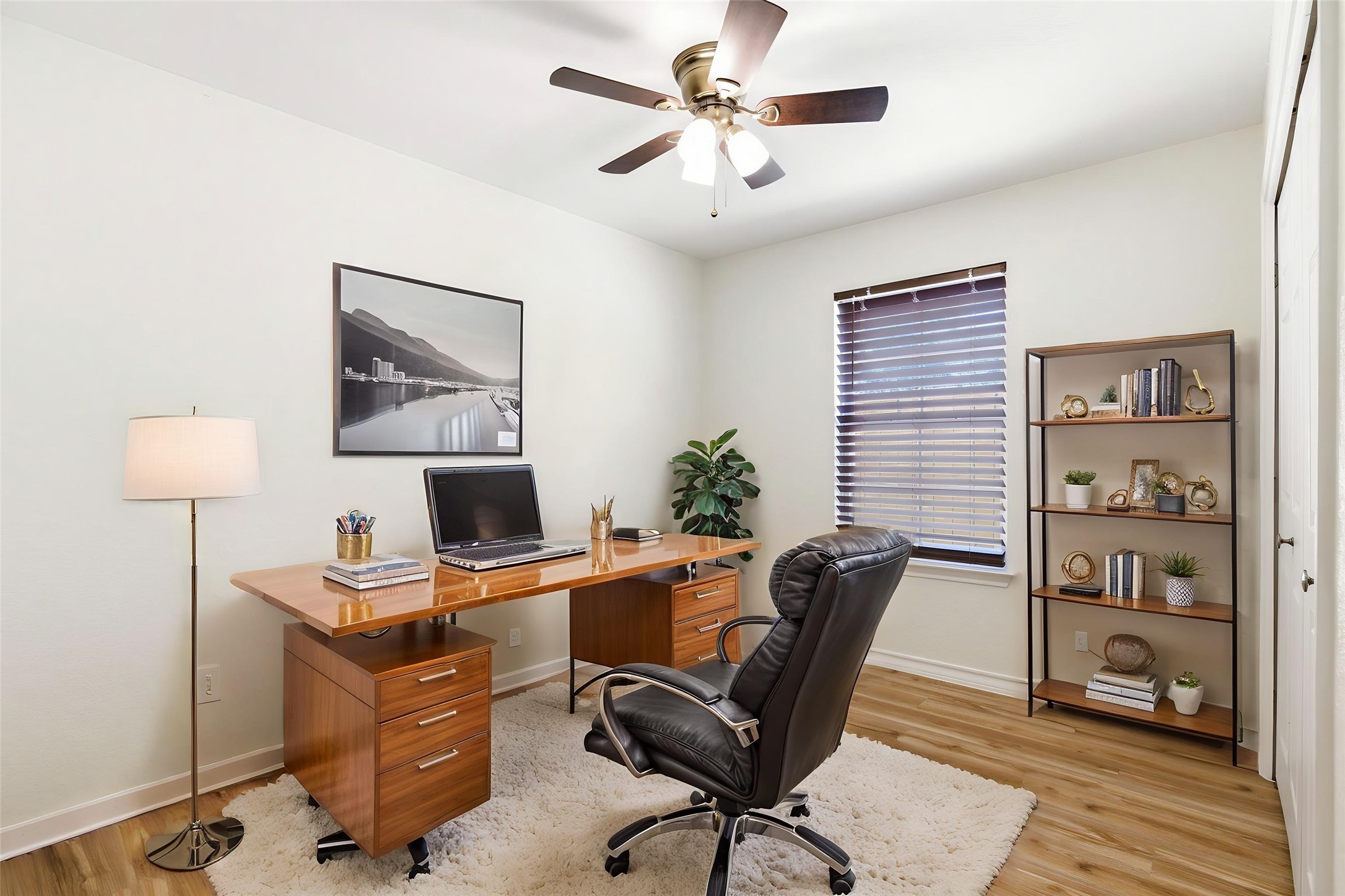 823 North Commerce Street, Unit A Lockhart, TX 78644 - Photo 21 of 28 a view of a workspace with furniture and a window