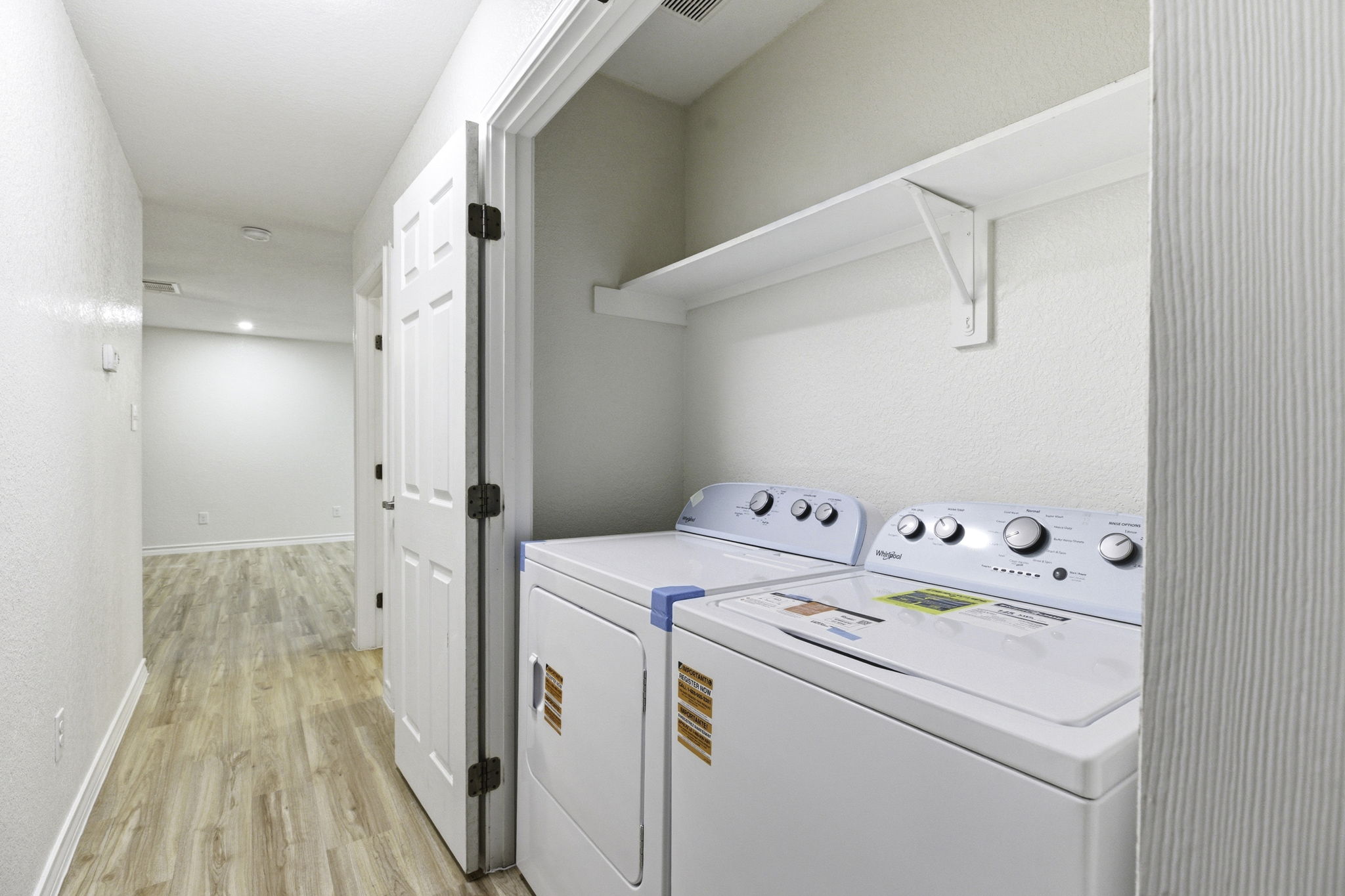 823 North Commerce Street, Unit A Lockhart, TX 78644 - Photo 26 of 28 a utility room with dryer and washer