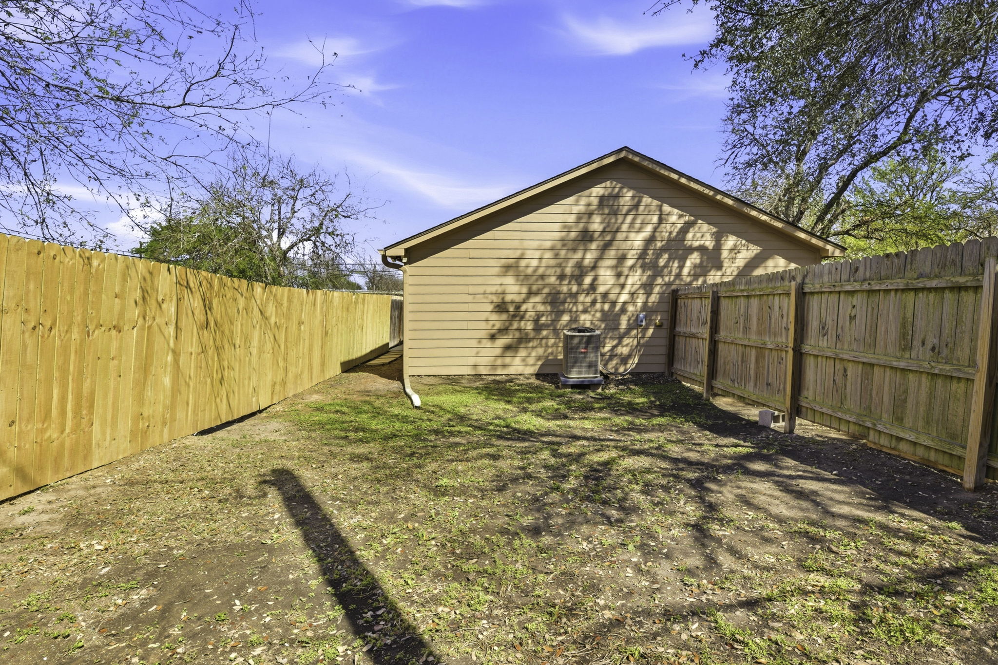 823 North Commerce Street, Unit A Lockhart, TX 78644 - Photo 28 of 28 a view of a backyard