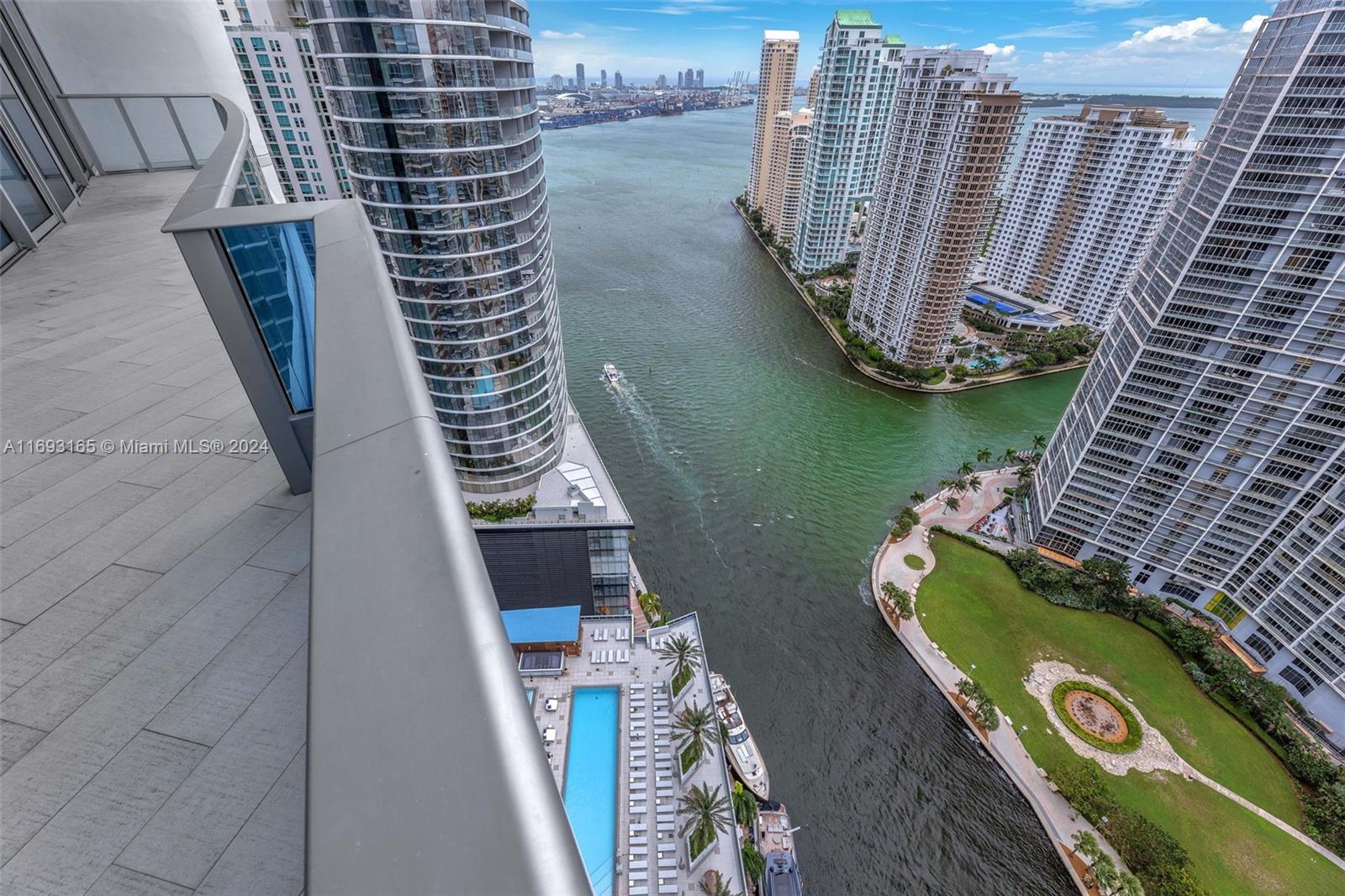 Downtown Miami Miami, FL 33131 - Photo 25 of 25 a view of a balcony with wooden floor