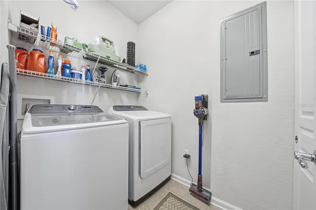 a utility room with dryer and washer