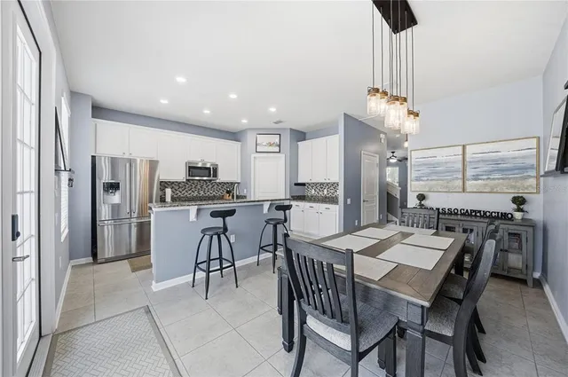 a view of a dining room with furniture