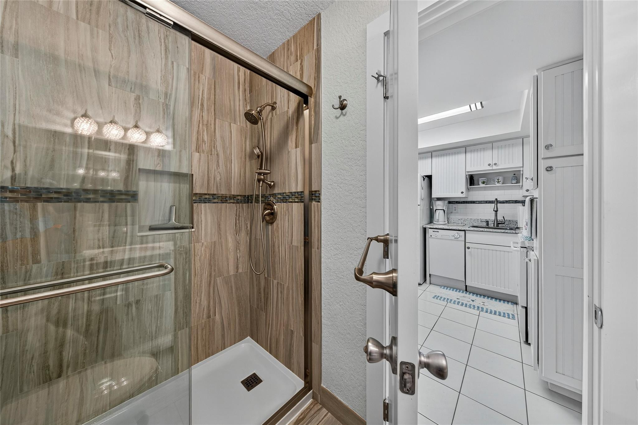 1201 North Riverside Drive, Unit 12B Pompano Beach, FL 33062 - Photo 45 of 63 a bathroom with a shower and a sink