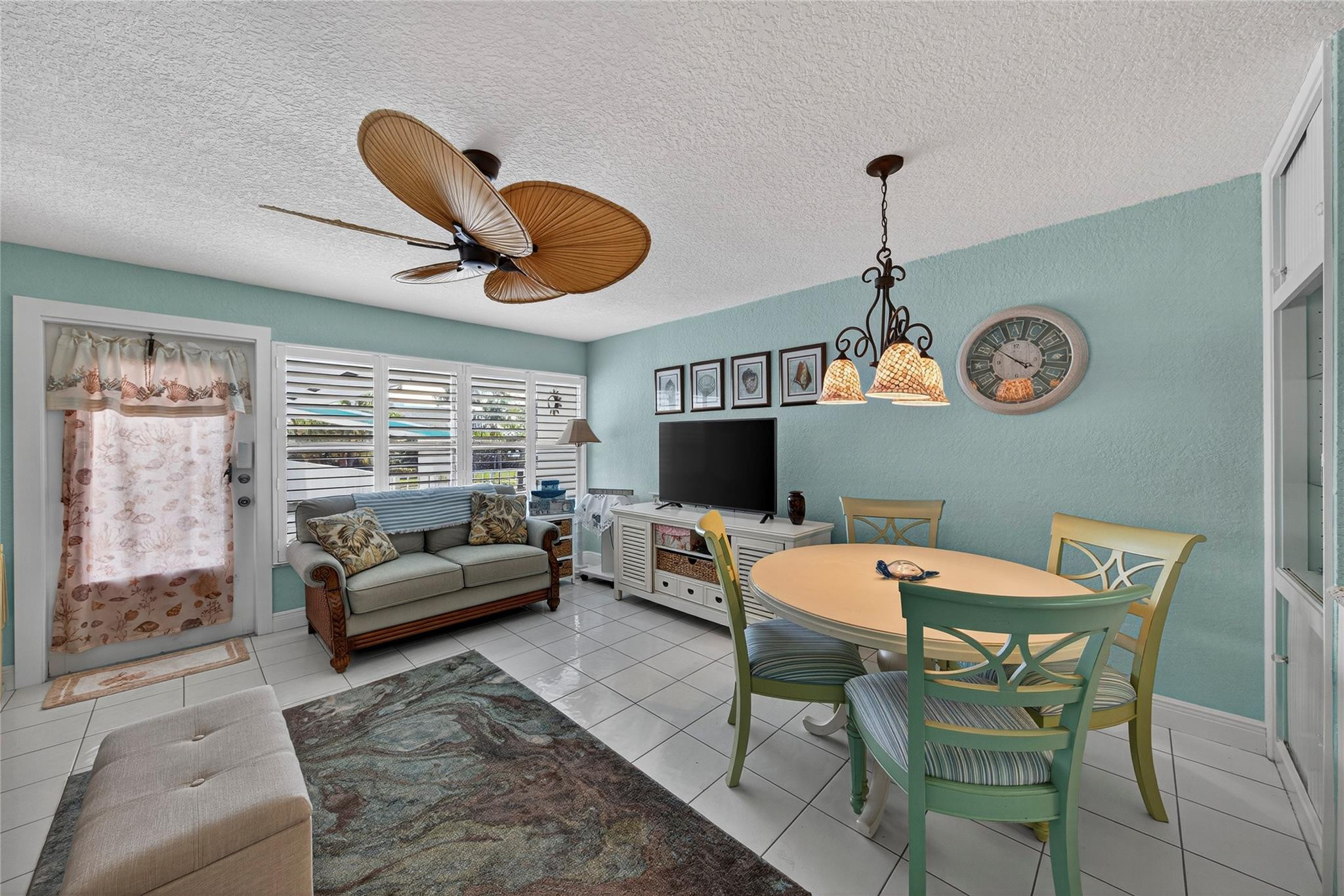 1201 North Riverside Drive, Unit 12B Pompano Beach, FL 33062 - Photo 50 of 63 a outdoor living space with furniture