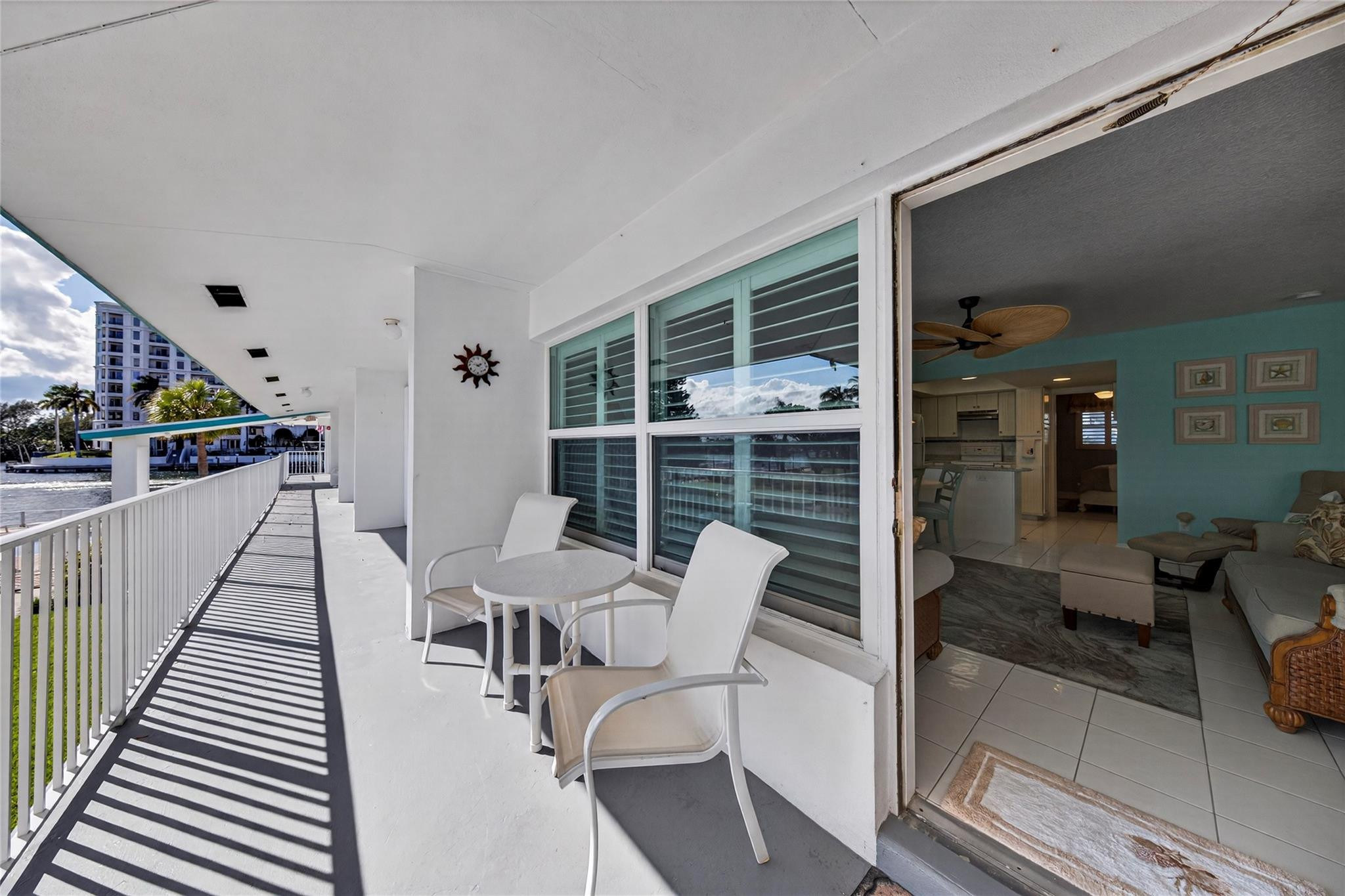 1201 North Riverside Drive, Unit 12B Pompano Beach, FL 33062 - Photo 60 of 63 a view of a chairs and table in a balcony
