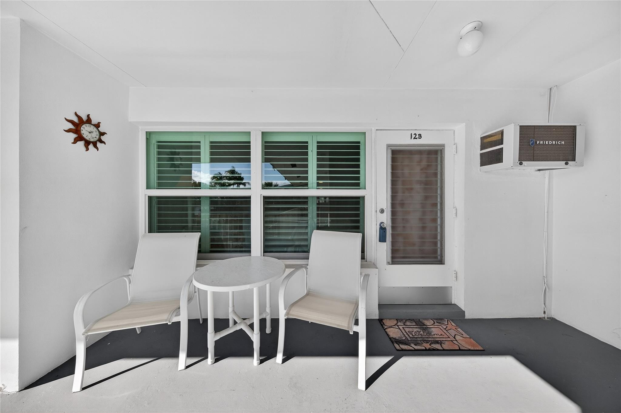 1201 North Riverside Drive, Unit 12B Pompano Beach, FL 33062 - Photo 62 of 63 a dining room with furniture and window