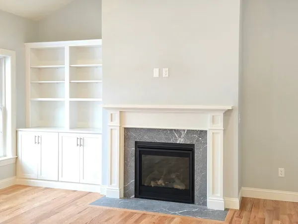 a living room with a fireplace