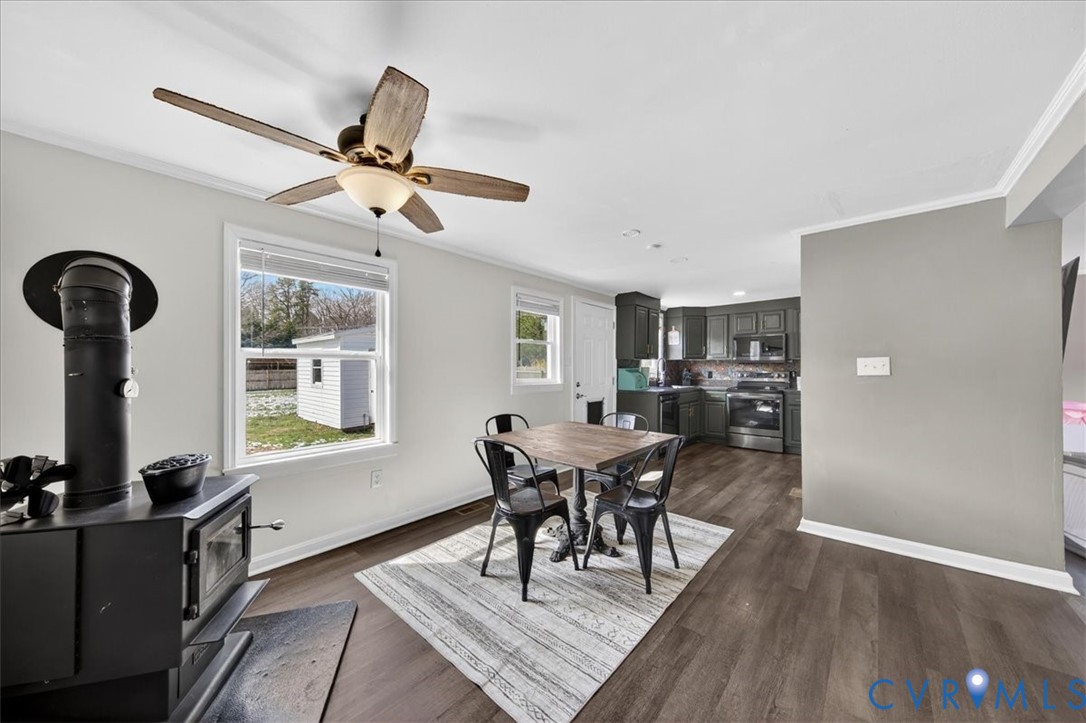 8427 Pamunkey Road Spotsylvania, VA 22551 - Photo 13 of 50 a view of a dining room with furniture and window