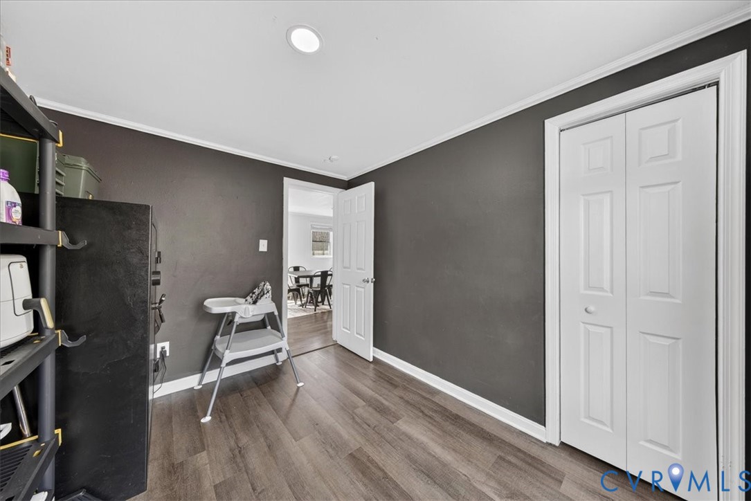 8427 Pamunkey Road Spotsylvania, VA 22551 - Photo 26 of 50 wooden floor and chair in a room