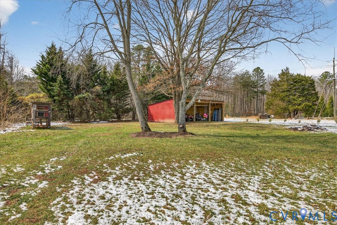 8427 Pamunkey Road Spotsylvania, VA 22551 - Photo 29 of 50 a backyard of a house with lots of green space