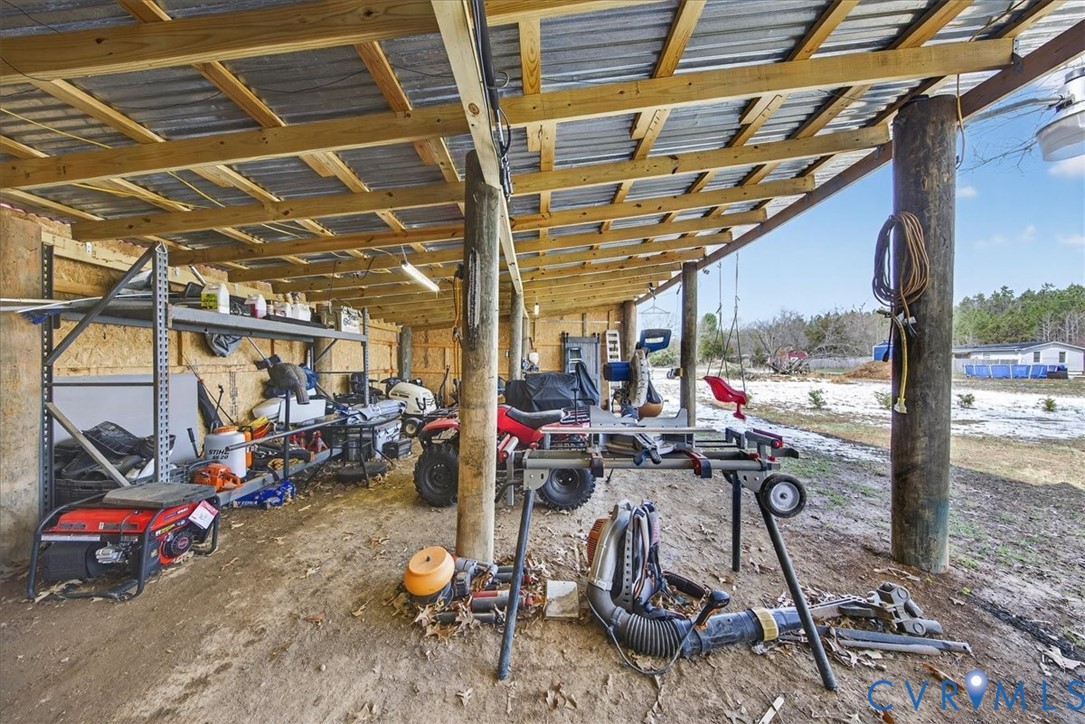 8427 Pamunkey Road Spotsylvania, VA 22551 - Photo 34 of 50 a view of a storage room with gym equipment