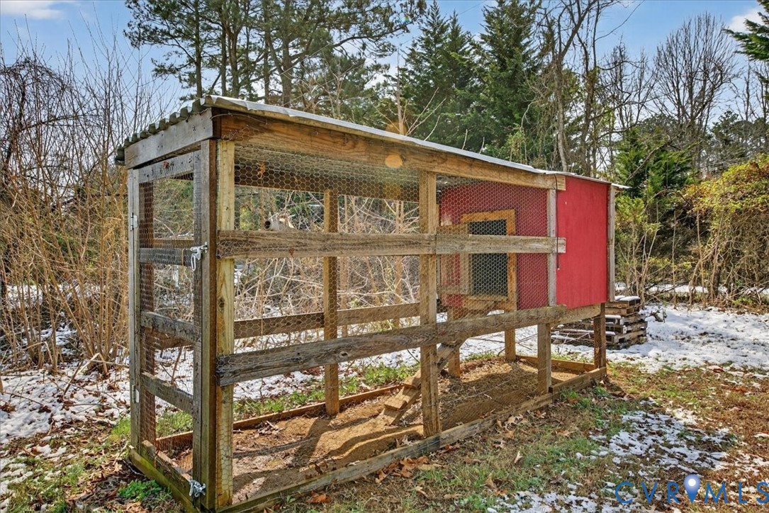 8427 Pamunkey Road Spotsylvania, VA 22551 - Photo 35 of 50 a red brick house with a large window and yard