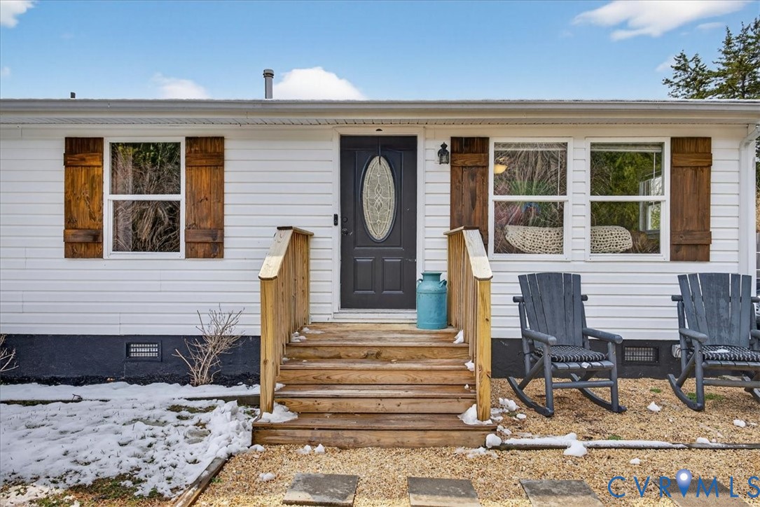 8427 Pamunkey Road Spotsylvania, VA 22551 - Photo 4 of 50 a front view of a house with entryway