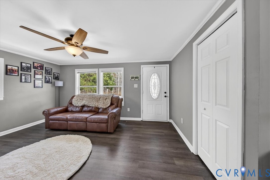 8427 Pamunkey Road Spotsylvania, VA 22551 - Photo 7 of 50 a living room with furniture and a window